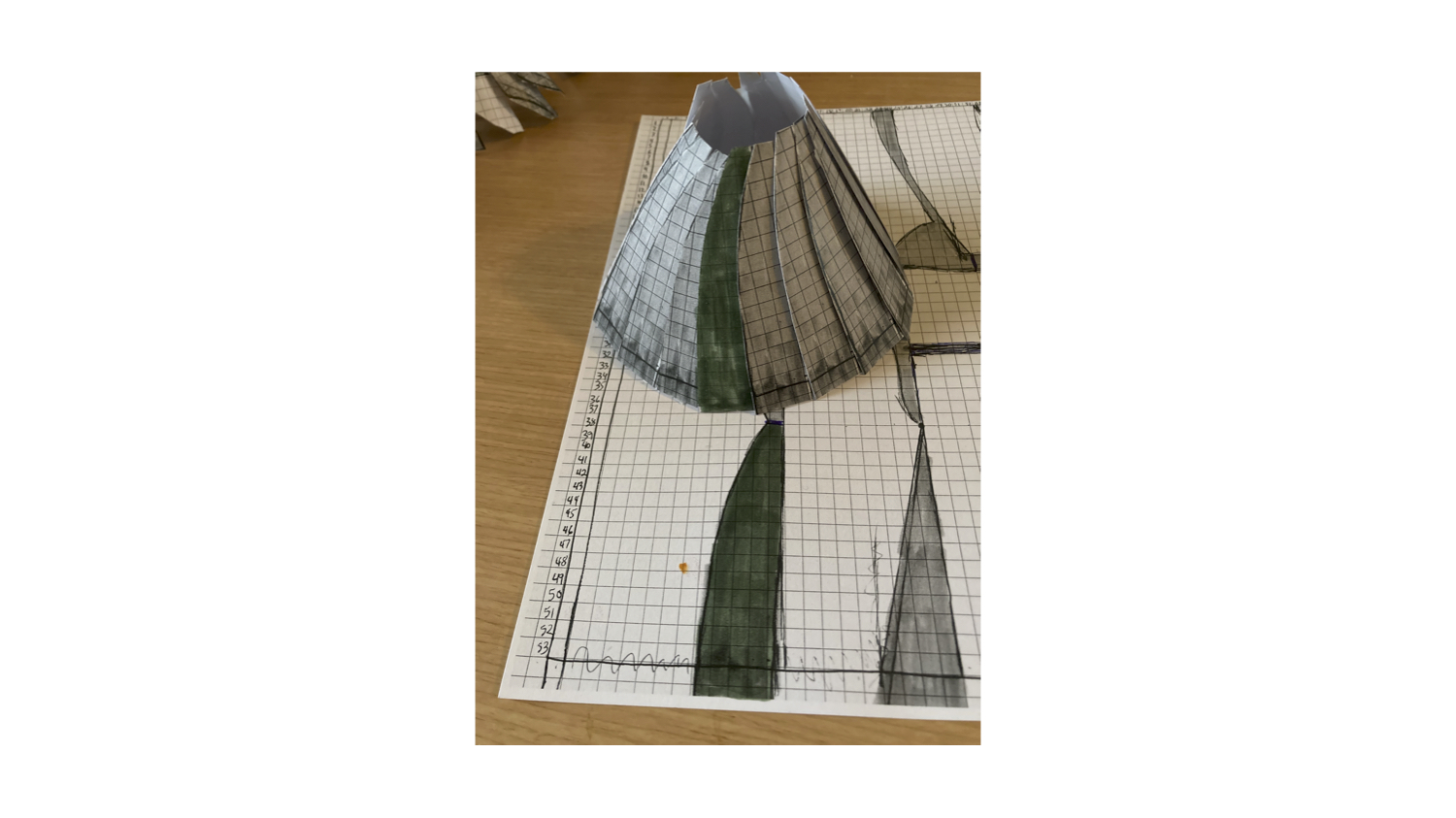 This is a block pattern waste shape turned into a skirt with out altering the found shape.  The size can be determined by using as many pieces as needed.