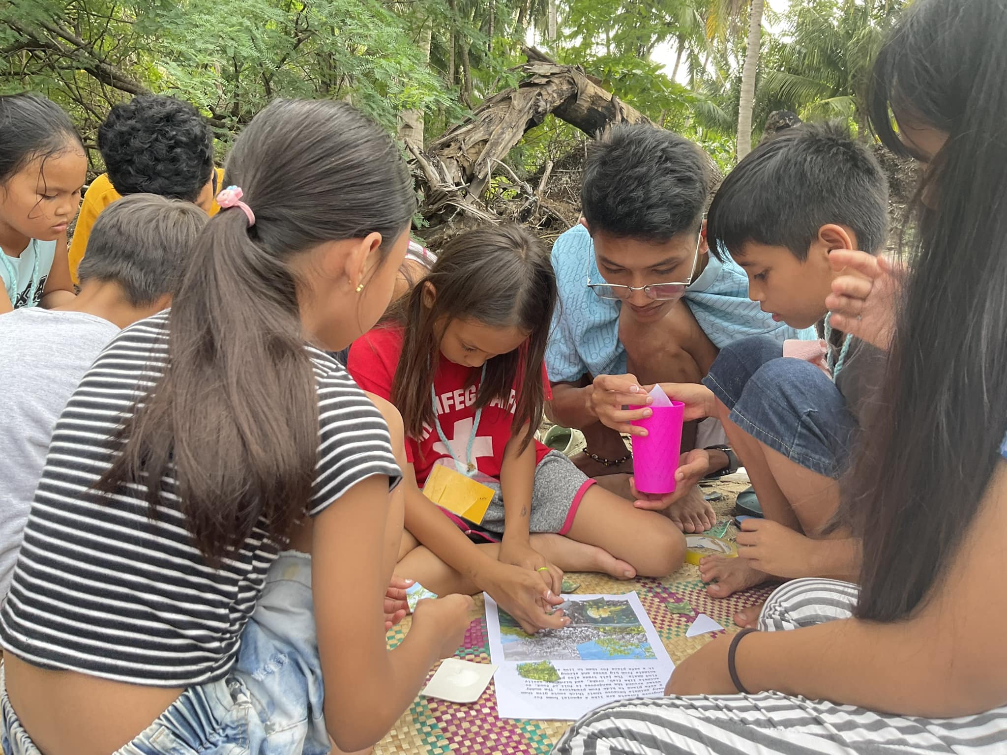 Youth learning about fish and coral reefs