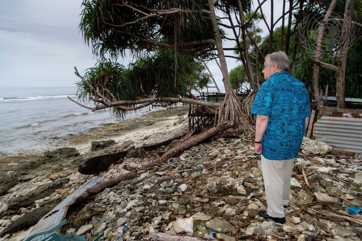 Figure 3. Secretary-General António Guterres looks out over the ocean in Tuvalu (2019). UN Photo/Mark Garten